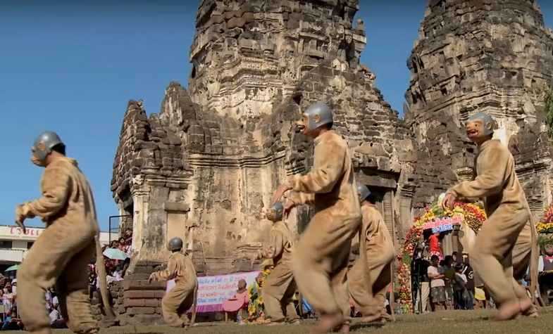 people disguise as macaques in temple festival
