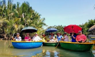 Boat rowing through water coconut forest, Hoi an, Vietnam