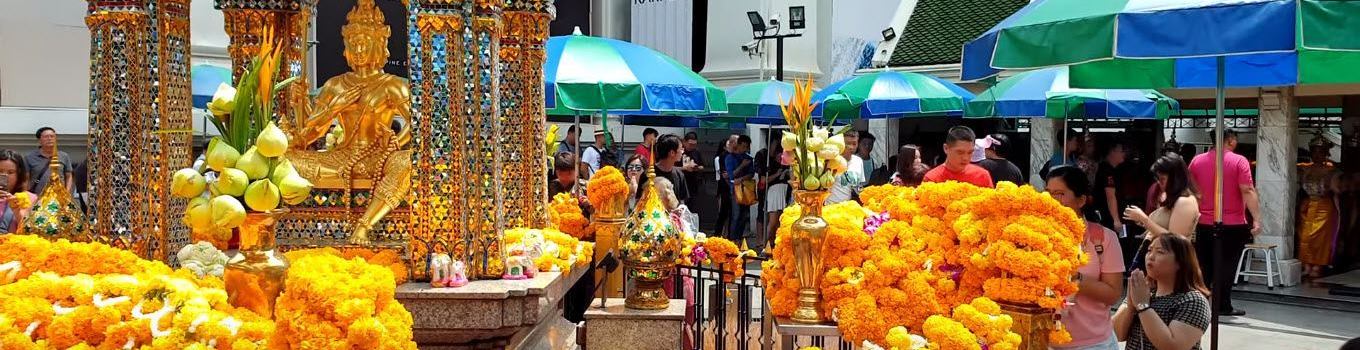 Offering at the Erawan temple, Bangkok, Thailand