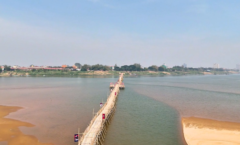 Kampong Cham: Rainy season, lush fields, and lotus blooms.