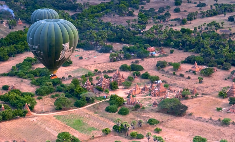 Hot air balloons flying at the Myanmar festival from October to March.